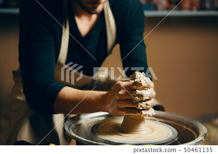 Modeling of clay on a potter's wheel in the 50461135