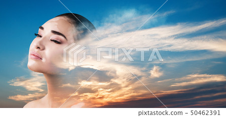Double exposure of woman and beautiful sunset. Double exposure of woman and beautiful sunset. 50462391