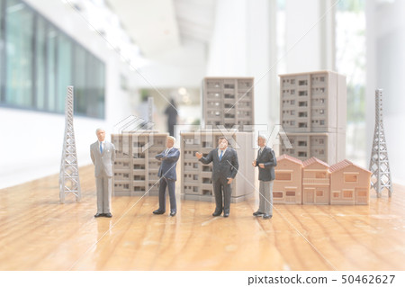 the mini of developer stand on the real estate 50462627