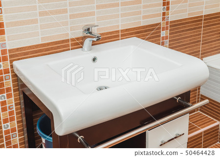 The photo of a sink in a bathroom The photo of a sink in a bathroom 50464428