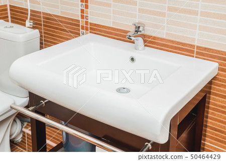 The photo of a sink in a bathroom The photo of a sink in a bathroom 50464429