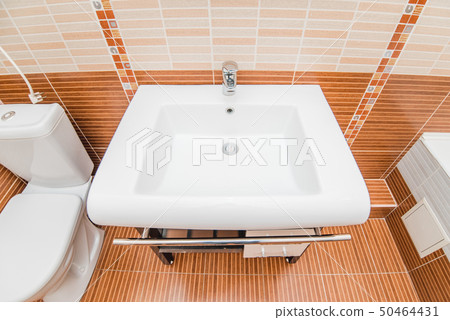 The photo of a sink in a bathroom The photo of a sink in a bathroom 50464431
