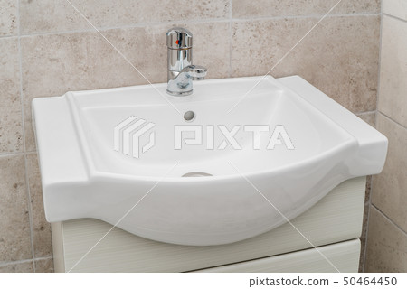 The photo of a sink in a bathroom The photo of a sink in a bathroom 50464450