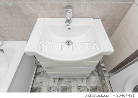 The photo of a sink in a bathroom 50464451