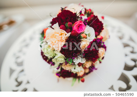Beautiful wedding bouquet with different flowers, roses Beautiful wedding bouquet with different flowers, roses 50465590