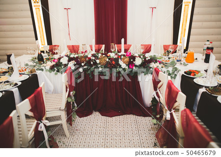 Interior of a restaurant prepared for wedding ceremony Interior of a restaurant prepared for wedding ceremony 50465679