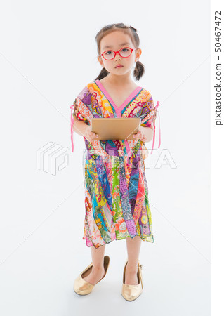 Little girl playing 50467472