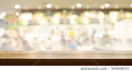 Empty wooden table top with blurred restaurant. 50469033