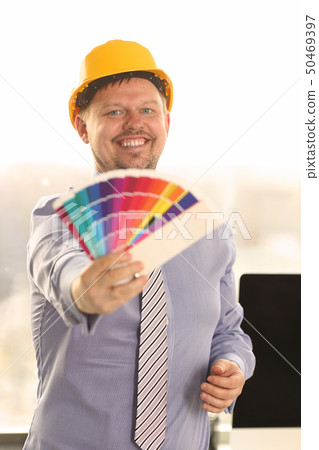 Graphic Designer Work on Project with Color Chart Graphic Designer Work on Project with Color Chart 50469397