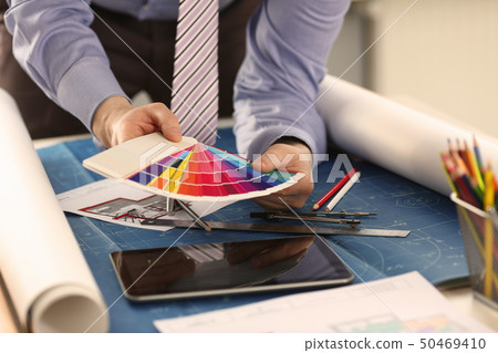 Interior Designer Working with Color Paint Swatch Interior Designer Working with Color Paint Swatch 50469410