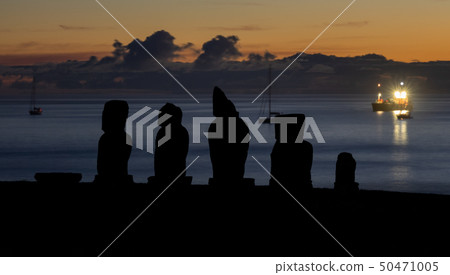 Moai shilouette of Tahai at sunset against silk ocean 50471005