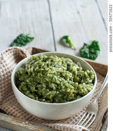 Risotto with spinach cream 50471622