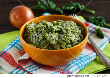 Risotto with spinach cream 50471646