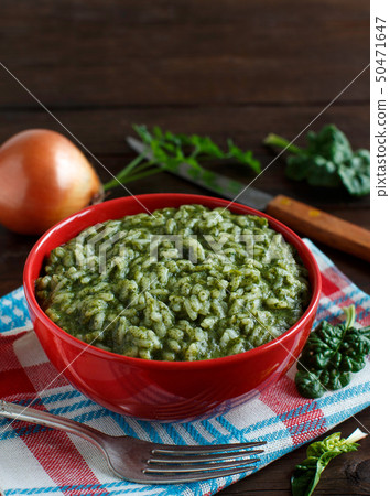 Risotto with spinach cream 50471647