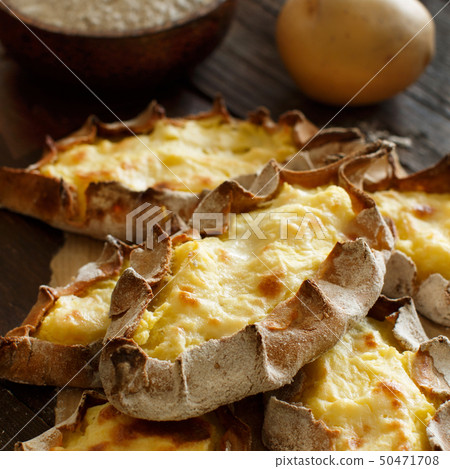 Traditional karelian pasties with potatoes Traditional karelian pasties with potatoes 50471708