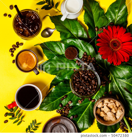 Various coffee on yellow background 50472380