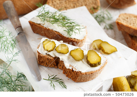 Sandwiches with cream cheese, dill and salted 50473026