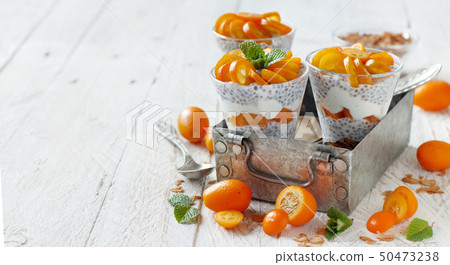 Chia pudding parfait with kumquat Chia pudding parfait with kumquat 50473238