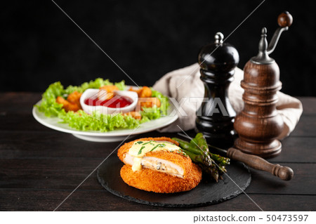 Cordon bleu and chicken nuggets Cordon bleu and chicken nuggets 50473597