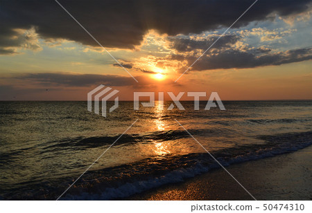 Sunset beams above Black Sea Sunset beams above Black Sea 50474310