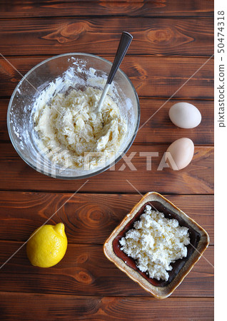 Making pastry with cottage cheese and lemon zest Making pastry with cottage cheese and lemon zest 50474318
