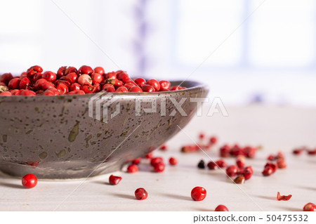 Pink peruvian pepper with blue window Pink peruvian pepper with blue window 50475532