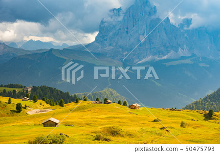 road and houses, green fields at Dolomites mountains, Italy road and houses, green fields at Dolomites mountains, Italy 50475793