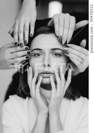 Girl face and hands that make different beauty salon service 50476522
