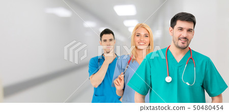 Doctor working in hospital with other doctors. 50480454