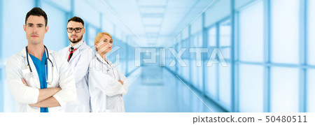 Doctor working in hospital with other doctors. Doctor working in hospital with other doctors. 50480511