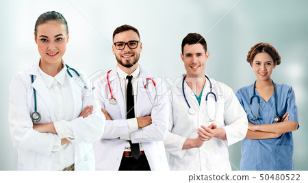 Doctor working in hospital with other doctors. 50480522
