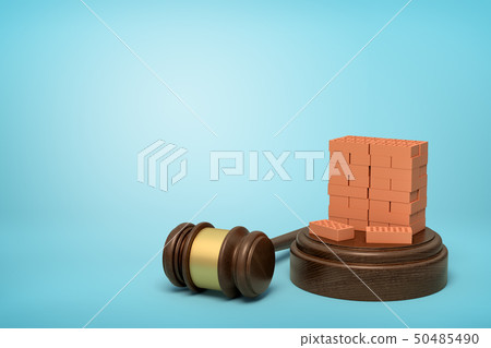 3d rendering of miniatured stack of red bricks on sounding block with gavel lying beside on light 50485490