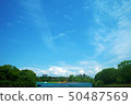 A vibrant and expansive blue sky 50487569