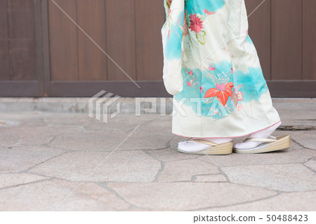 Woman walking with kimono Woman walking with kimono 50488423