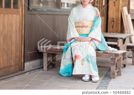 Woman in long-sleeved kimono 50488882