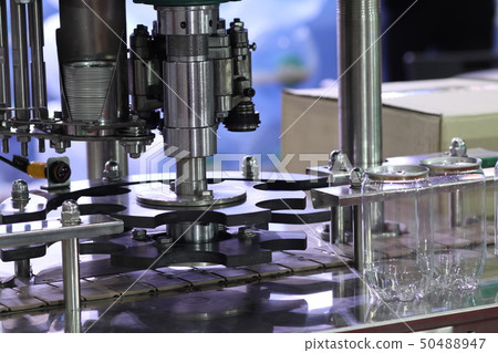 Aluminum lid packing machine for plastic can Aluminum lid packing machine for plastic can 50488947