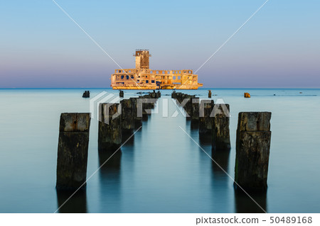 Old torpedo launcher and breakwater near Gdynia, 50489168