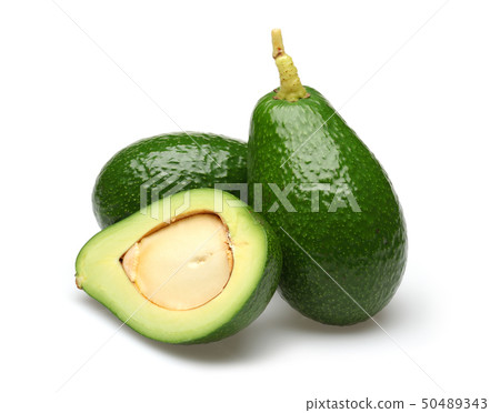 Whole and half green avocados isolated on white 50489343