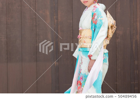 Woman in long-sleeved kimono Woman in long-sleeved kimono 50489456