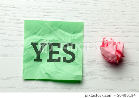 Wrinkled office paper for writing and writing on green paper YES. Wrinkled office paper for writing and writing on green paper YES. 50490184