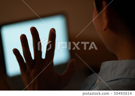 Man making a video call Man making a video call 50493814