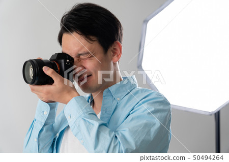 Photographer taking pictures 50494264