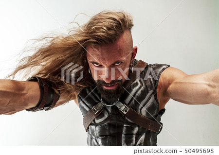 Man in cosplaying Thor isolated on white studio background Man in cosplaying Thor isolated on white studio background 50495698