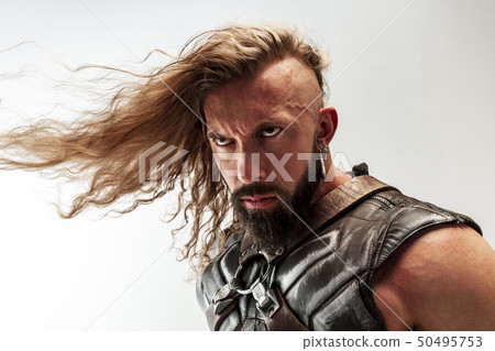 Man in cosplaying Thor isolated on white studio background Man in cosplaying Thor isolated on white studio background 50495753