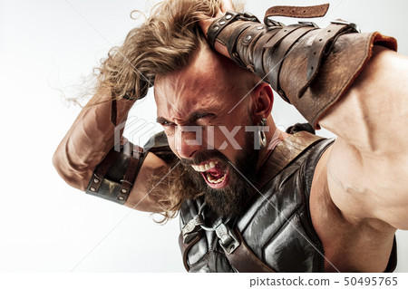 Man in cosplaying Thor isolated on white studio background Man in cosplaying Thor isolated on white studio background 50495765