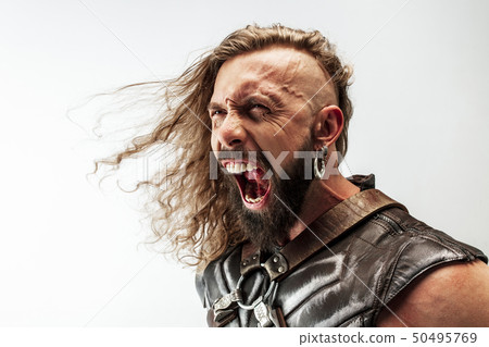 Man in cosplaying Thor isolated on white studio background Man in cosplaying Thor isolated on white studio background 50495769