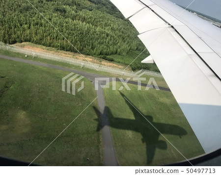 Shadow of an airplane Shadow of an airplane 50497713