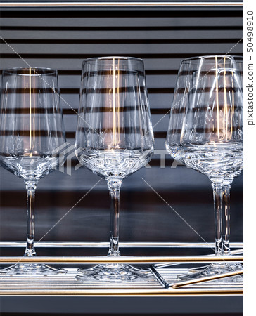 Brandy glasses and wineglasses on the shelf. Brandy glasses and wineglasses on the shelf. 50498910