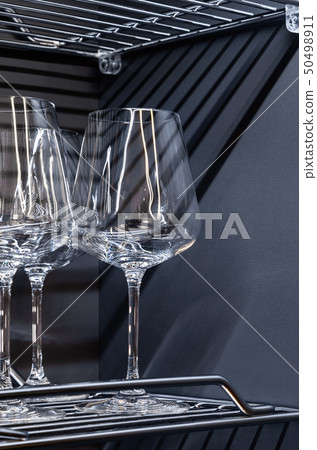 Brandy glasses and whiskey glasses on the shelf. Brandy glasses and whiskey glasses on the shelf. 50498911