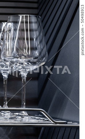 Brandy glasses and whiskey glasses on the shelf. Brandy glasses and whiskey glasses on the shelf. 50498913